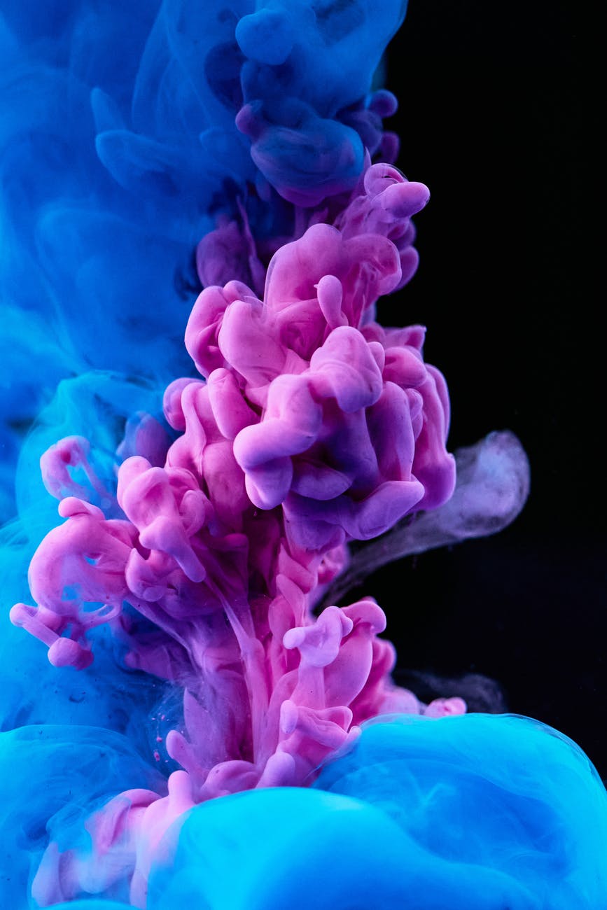 high speed photography of colorful ink diffusion in water